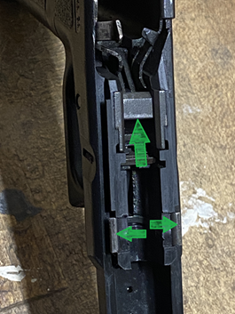 Pistol frame oil spots